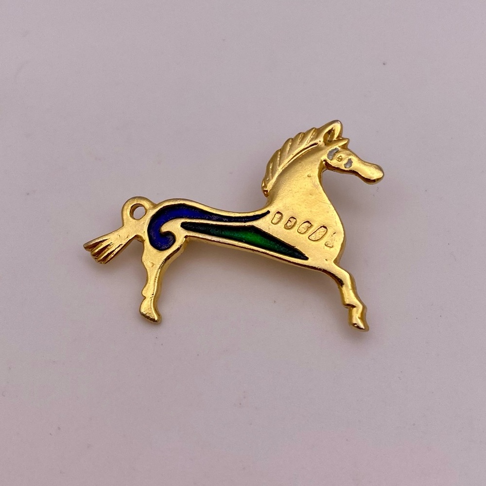 Gold-tone and enamel Roman reproduction horse brooch